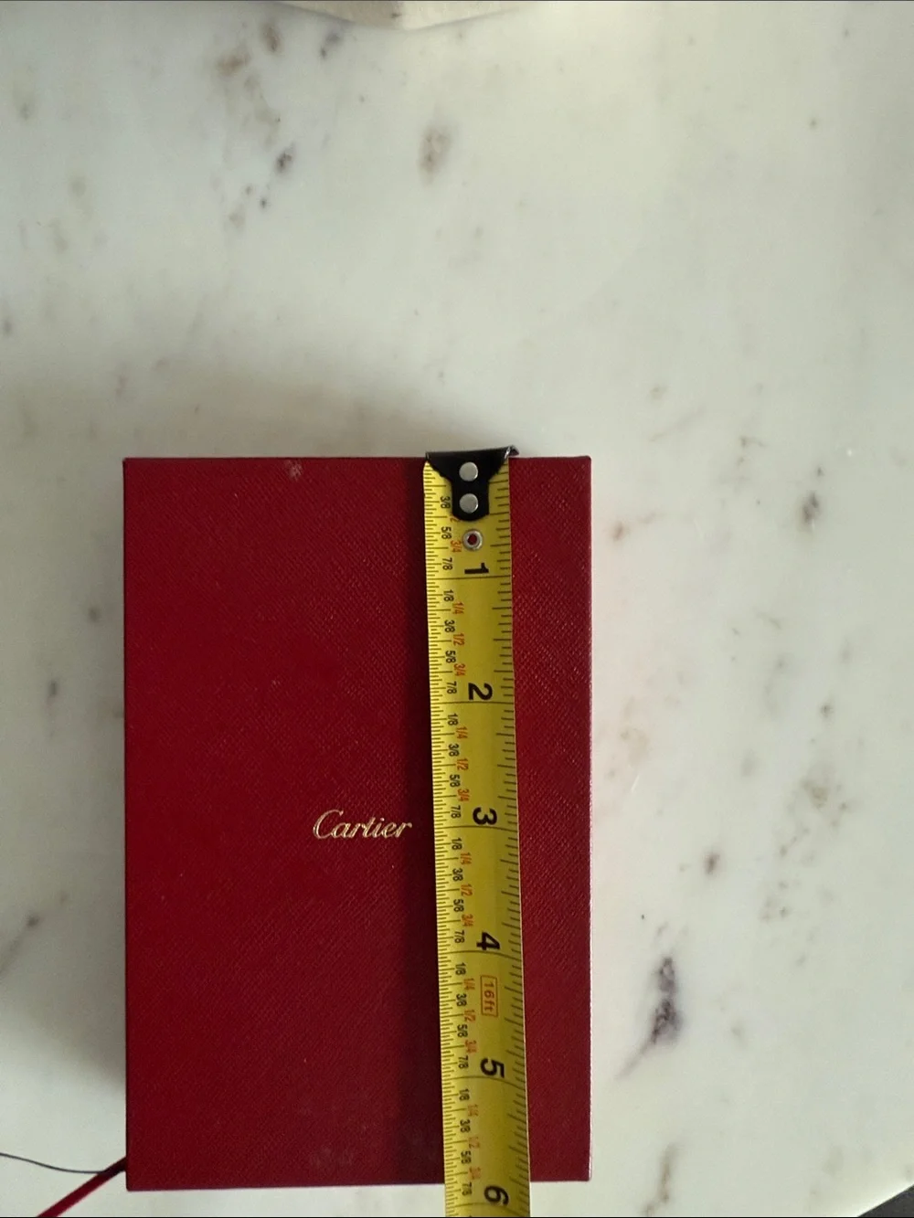 Cartier Red and Black Hardcover Notebooks with Gold Accents
